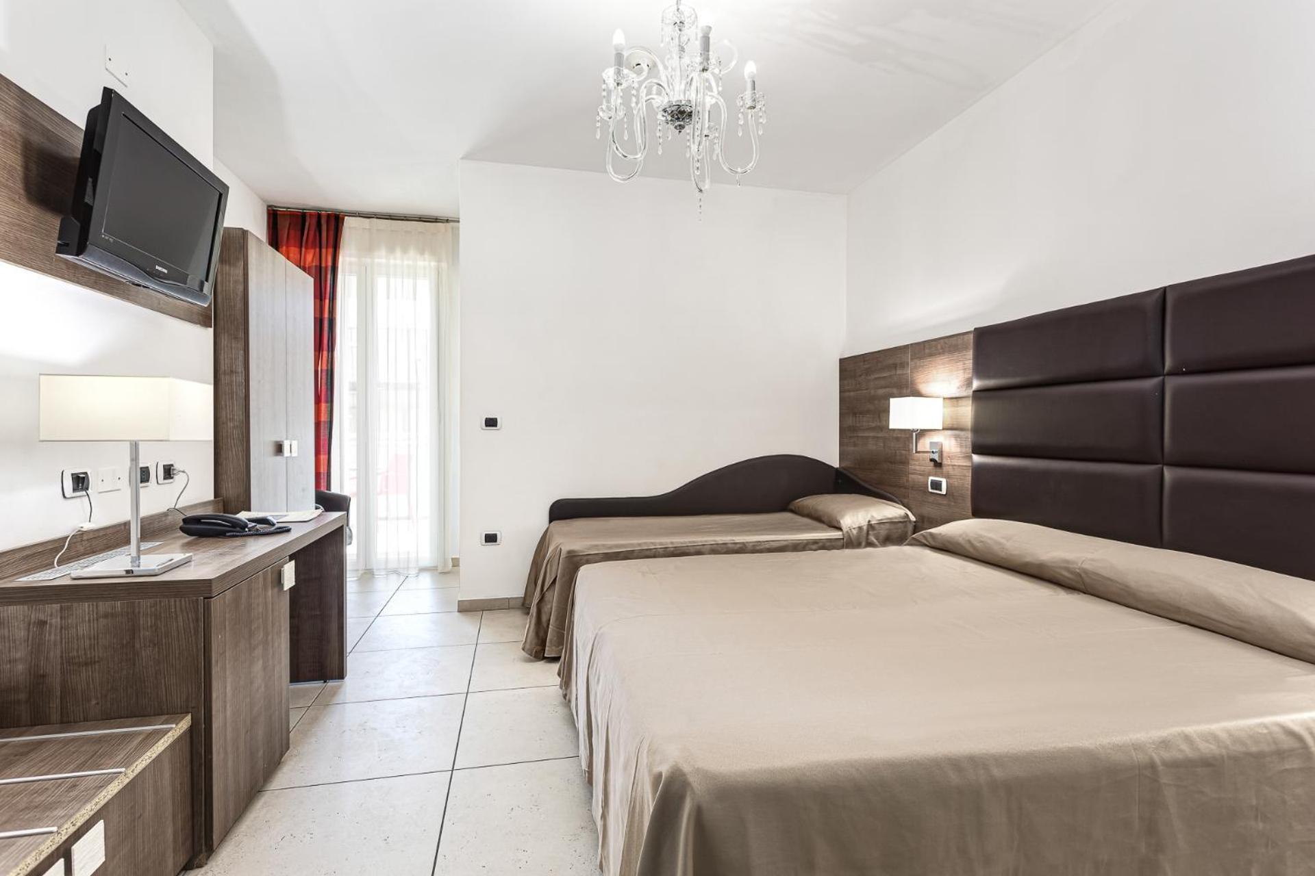Dreibettzimmer mit Balkon